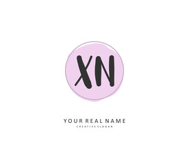 X N XN Initial letter handwriting and signature logo. A concept handwriting initial logo with template element.