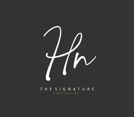 H N HN Initial letter handwriting and signature logo. A concept handwriting initial logo with template element.
