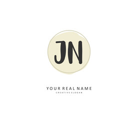 J N JN Initial letter handwriting and signature logo. A concept handwriting initial logo with template element.