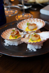 Scallops in yellow butter sauce