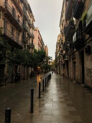 Fototapeta na wymiar Rainy cozy streets of Barcelona