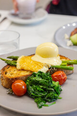 Eggs benedict on sourdough toast