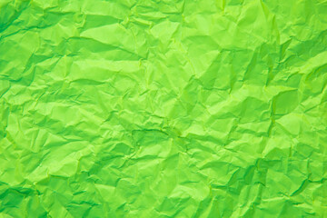 Fototapeta premium Close up of green wrinkle crumpled old with paper page texture rough background. crease grunge parchment pattern vintage design