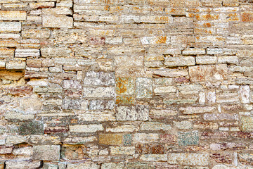 Background. Ancient masonry of a brick wall.