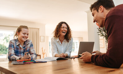 Fototapeta premium Smiling family together at home