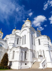 Obraz premium Orthodox Church against the blue sky with clouds in summer