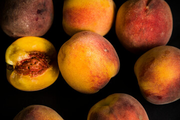 peaches on a black background