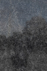 Black marble texture. Dark stone material background. Old grunge tile natural decor. Art floor surface design closeup. Complex bathroom interior