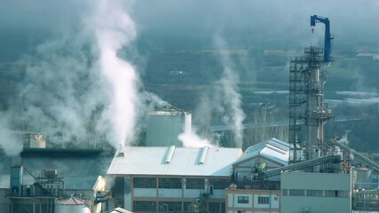 Factory with smoking chimneys. Navarre, Spain, Europe.