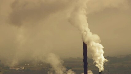 Factory with smoking chimneys. Navarre, Spain, Europe.