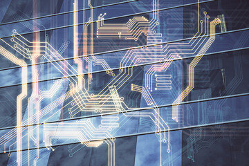 Double exposure of technology theme hologram and cityscape background. Concept of Hightech.