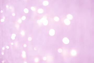 abstract background. light pink blurry lights. bokeh. texture. concept for christmas, new year, holiday