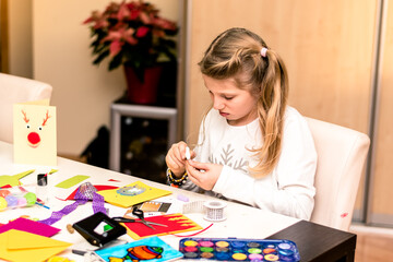 Fototapeta premium lovely child creating dyi creative stuff