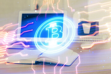 Double exposure of blockchain theme hologram and table with computer background. Concept of bitcoin...