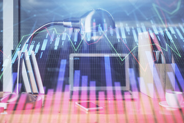 Stock market chart hologram drawn on personal computer background. Multi exposure. Concept of investment.
