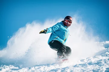 Fotobehang Freeride powder, snowboarding in Les deux alpes resort in winter, mountains in French alps, Rhone Alpes in France. Freeride in helmet on powder snow. © Chawran