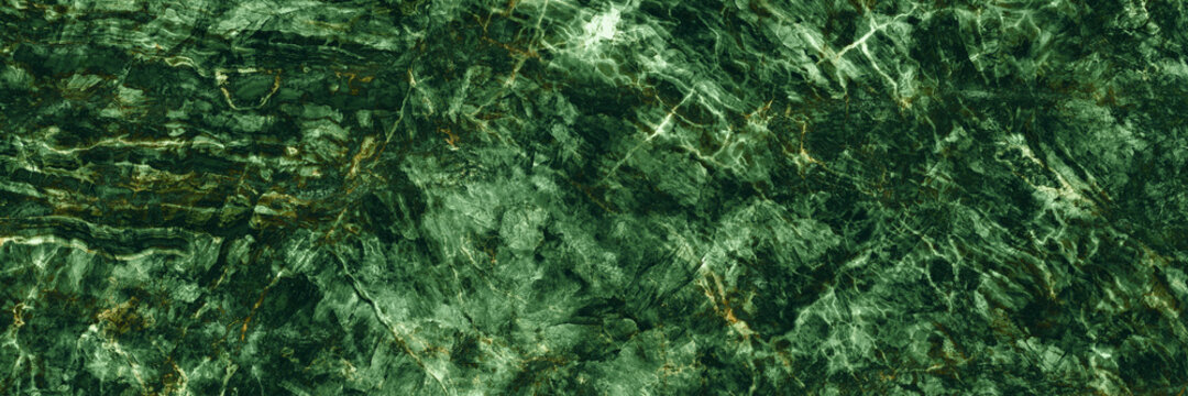 natural pattern of green marble background, Surface rock stone with a pattern of Emperador marbel, Close up of abstract texture with high resolution, polished quartz slice mineral for exterior. 