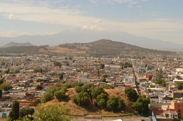 The city of Heroica Puebla de Zaragoza at the foot of the Popocatepetl volcano, Mexico