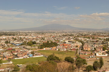 The city of Heroica Puebla de Zaragoza at the foot of the Popocatepetl volcano, Mexico