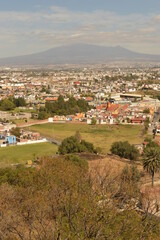 Fototapeta na wymiar The city of Heroica Puebla de Zaragoza at the foot of the Popocatepetl volcano, Mexico