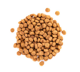 Dry pet food, isolated on white background. Pile of granulated animal feeds. Granules of good nutrition for dogs and cats. Top view.