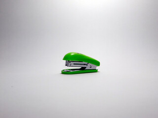 green stapler