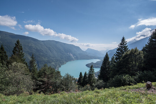 Molveno Lake, located in Trentino, by Molveno village, surrounded by Brenta group in the west & Gazza & Pagenella mountains in the south & east, as seen from Pradel high plain, Dolomites, Italy