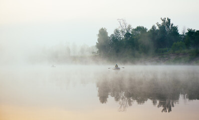 morning fisherman on the lake