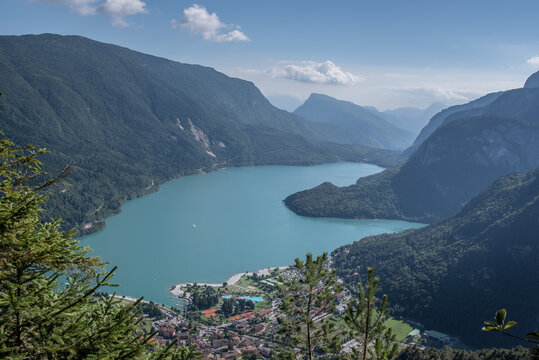 Molveno Lake, located in Trentino, by Molveno village, surrounded by Brenta group in the west & Gazza & Pagenella mountains in the south & east, as seen from Pradel high plain, Dolomites, Italy