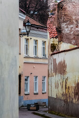 Narrow, colorful street in the old town of Vilnius, Lithuania.