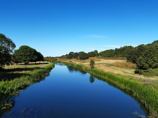 Fototapeta na wymiar River with blue sky