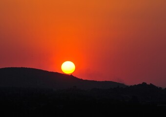 Naklejka premium Sonnenuntergang Hampi Indien