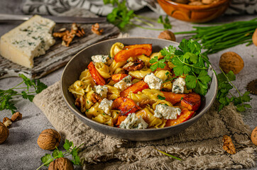 Homemade pasta with roasted pumpkin and blue cheese