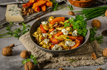 Homemade pasta with roasted pumpkin and blue cheese