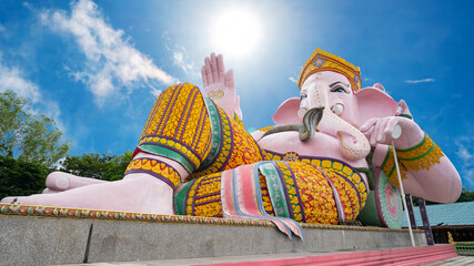 Hindu God Ganesha with blue sky background Big Ganesha statue in Ganesha park temple Nakhon Nayok province Thailand.