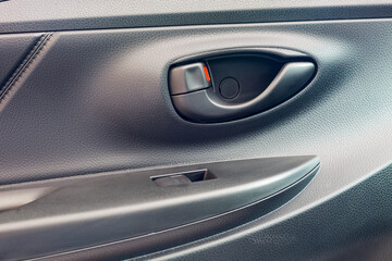 Close up image of new modern car door opener.