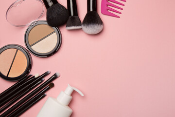 Obraz na płótnie Canvas Makeup cosmetics on pink background copycpase