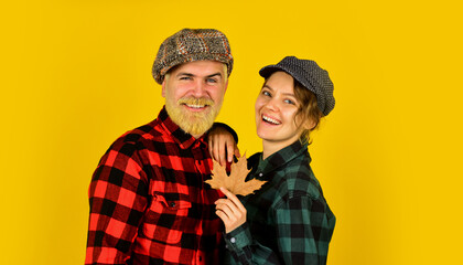 retro couple autumn leaves. man and woman hold maple leaf. farmer in countryside collect fallen leaves. fall seasonal concept. Autumn harvest with Farmers. Happy Thanksgiving day