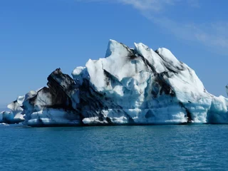 Fotobehang Awesome iceberg in jokulsarlon lagoon, Iceland © OLENA