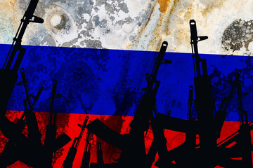 Several automatic rifles raised up on the background of the Russian flag