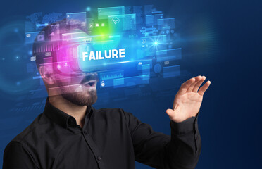 Businessman looking through Virtual Reality glasses with FAILURE inscription, innovative security concept