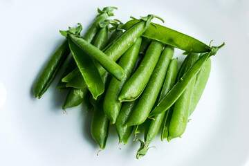 Pile of pea peels on an isolated white background.