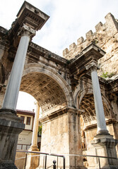 Fototapeta na wymiar Hadrian`s Gate Uckapilar in old city of Antalya Kaleici, Turkey.
