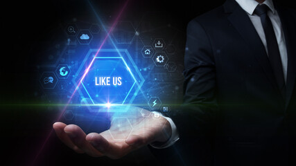 Man hand holding LIKE US inscription, social media concept