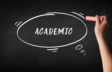 Hand drawing ACADEMIC inscription with white chalk on blackboard, education concept