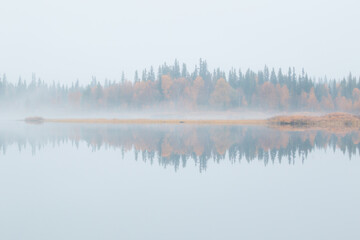 Lake and fog in autumn