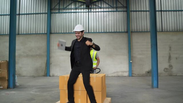 The engineer was having fun playing the cart with the inspector.
