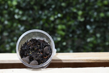 macro view of different teas on a green background