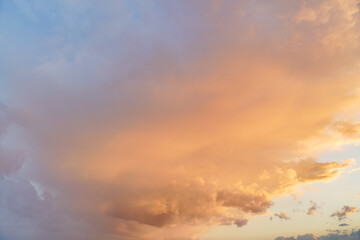 Orange pink evening sky just after sunset - afternoon clouds background