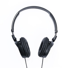 Fototapeta na wymiar Modern black wired headphones isolated on a white background in close-up